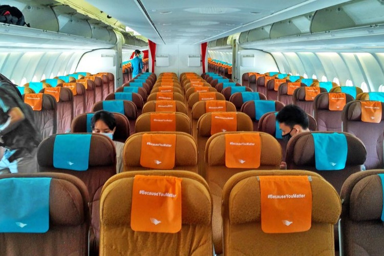 Perbedaan Kelas Ekonomi Garuda Indonesia Begini Fasilitas dan Pelayanannya 